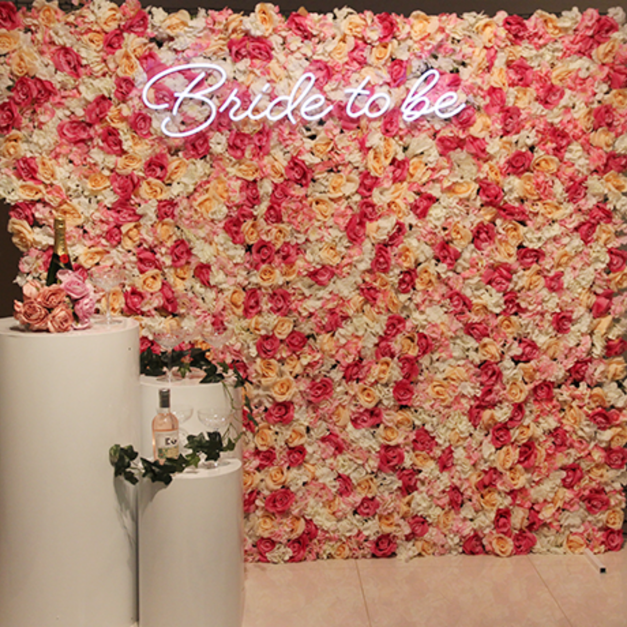 Bride to be sign and floral backdrop